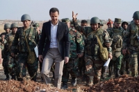 Ο Άσαντ επέκρινε σήμερα τον Τούρκο ομόλογό του Ρετζέπ Ταγίπ Ερντογάν για την απόφασή του να εξαπολύσει στρατιωτική επιχείρηση στη βορειοανατολική Συρία και επανέλαβε τη δέσμευσή του να ανακαταλάβει τις περιοχές που η Δαμασκός έχει χάσει έπειτα από χρόνια εμφυλίου.